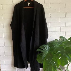 Black, knit, sleeveless, shall